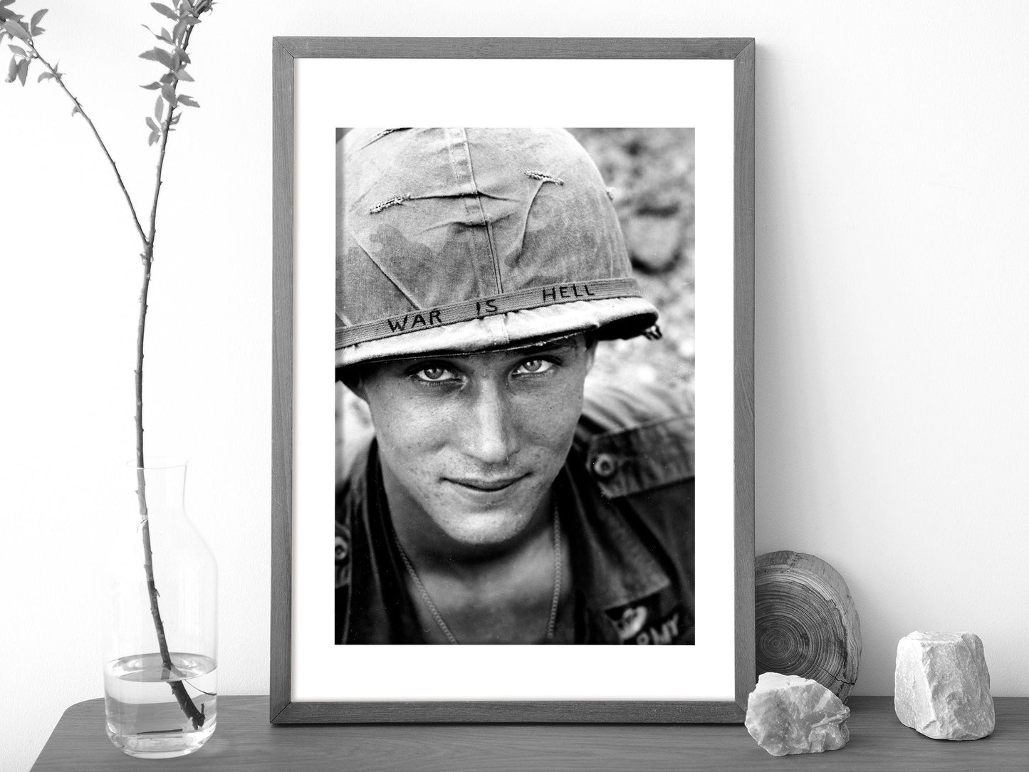 Vietnam War Photo Poster, An American US Soldier wears a hand-lettered War Is Hell Helmet